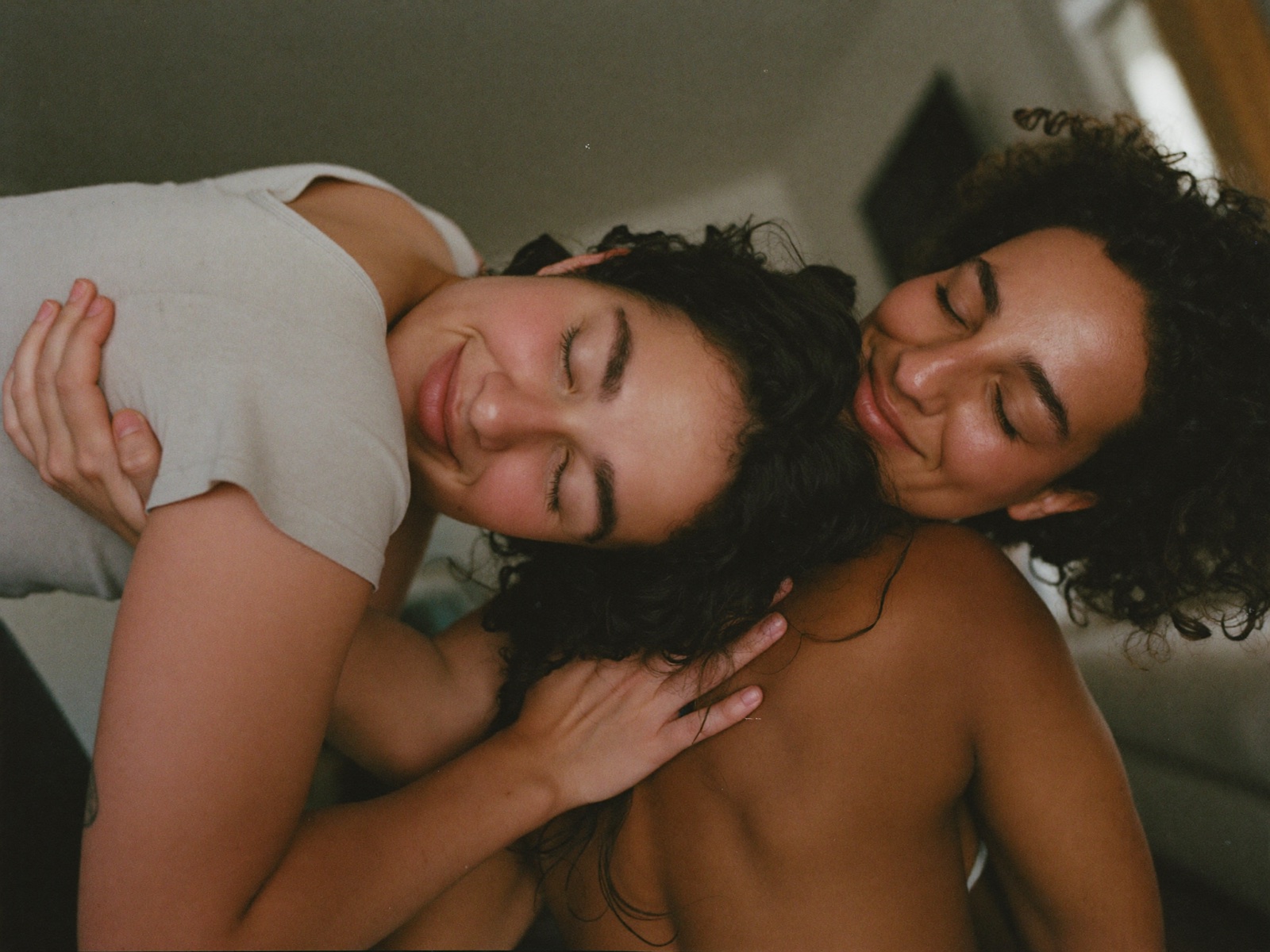 Two people in a long, relieved hug