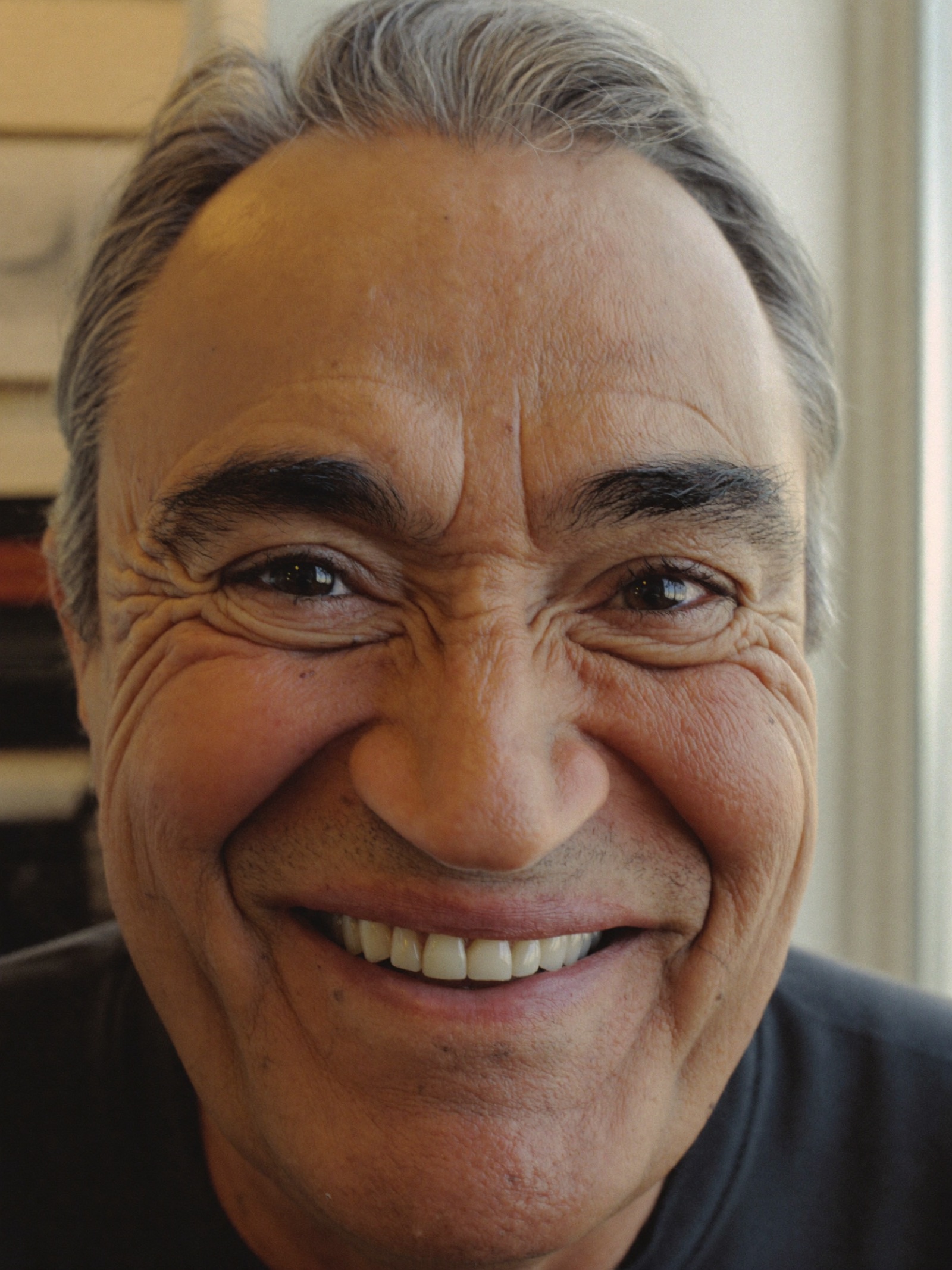 An older man with kind eyes