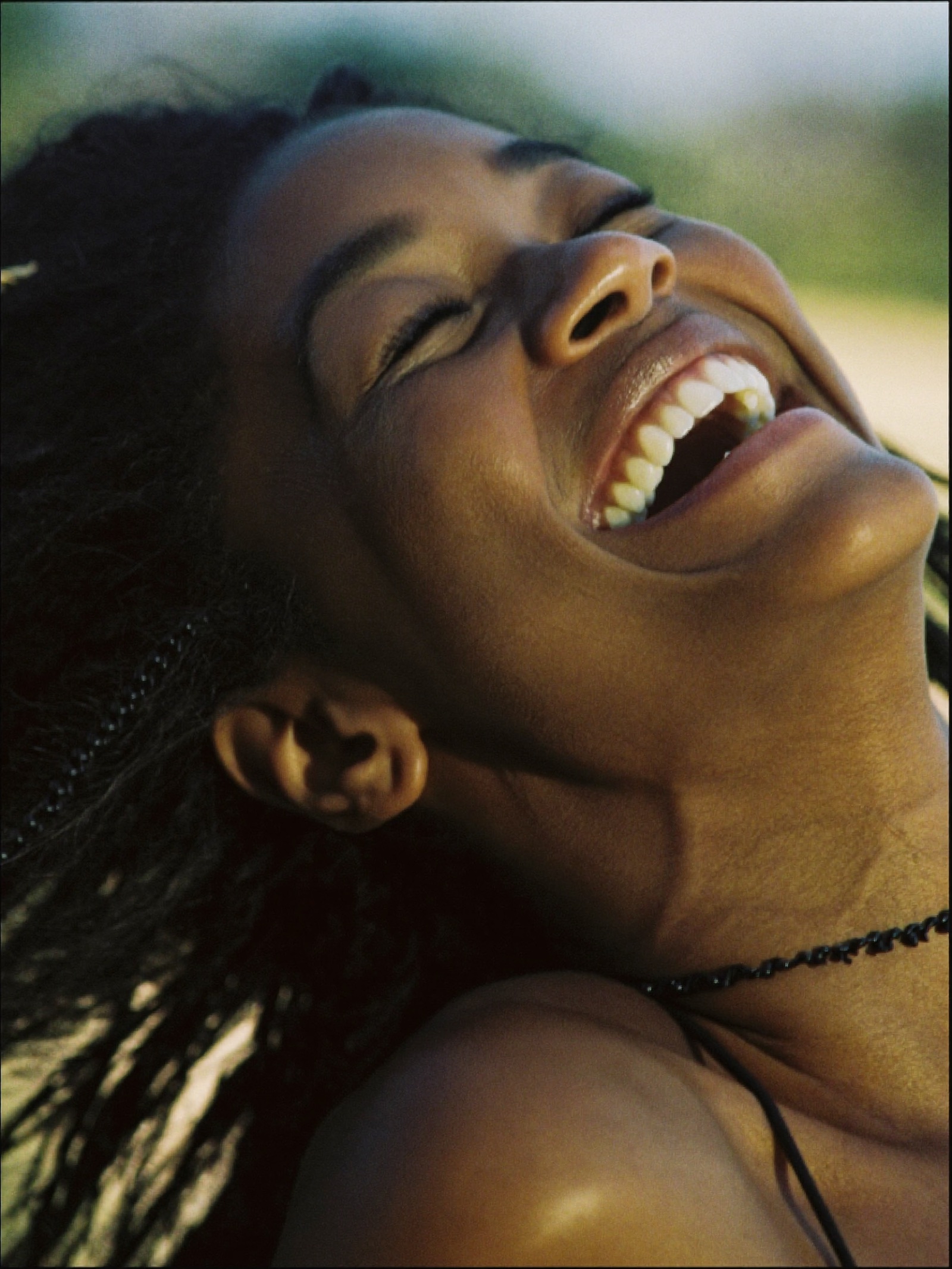 A woman laughing freely